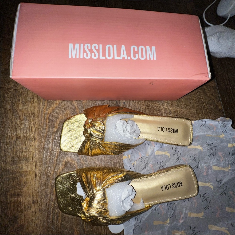 Pretty golden flats. Never worn!